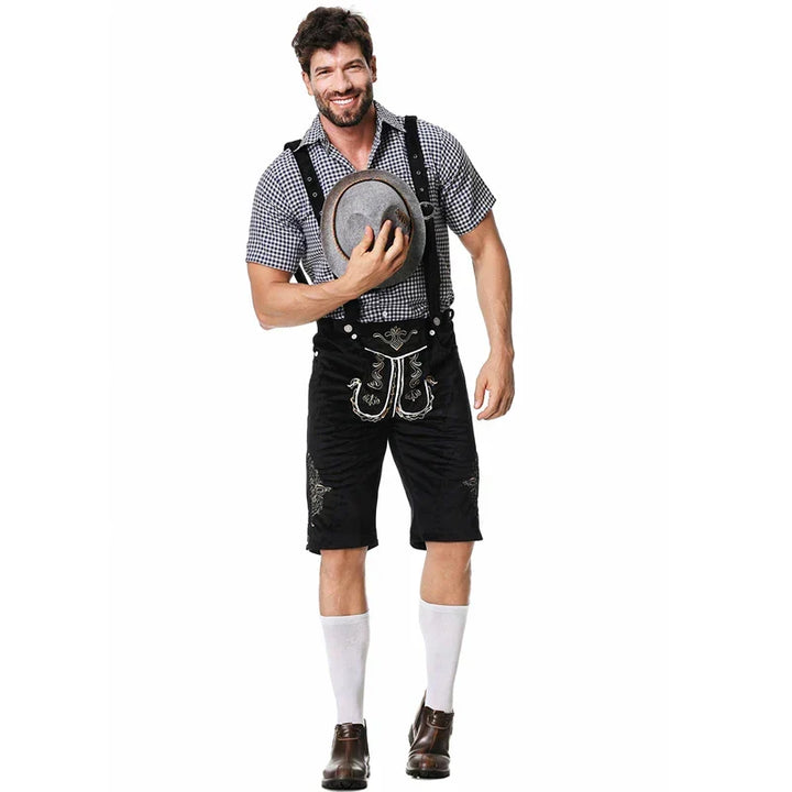 Set tradizionale bavarese da uomo per Oktoberfest con pantaloni lederhosen e camicia a quadri.