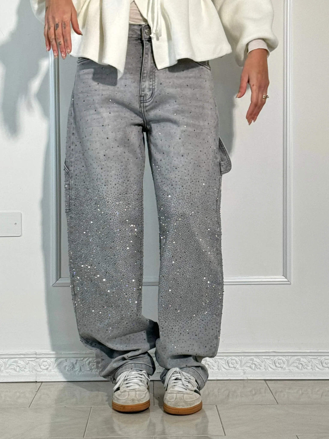 Jeans balloon donna azzurri, vita alta e gamba larga con discreti dettagli luminosi.