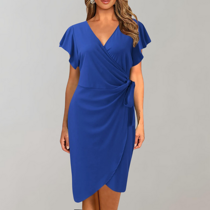 Dettaglio tessuto fresco e leggero dell'abito estivo midi donna, ideale per la moda femminile e il comfort.