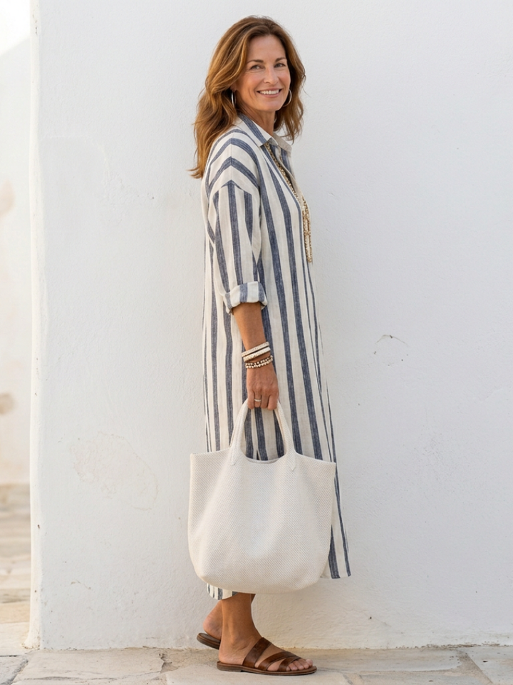 Vestito da giorno a righe, stile casual chic. Abito midi donna versatile per un look moda primavera/autunno.