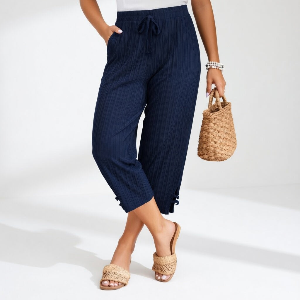 Pantaloni estivi da donna fluidi e leggeri, ideali per comfort e stile. Perfetti per le vacanze o outfit casual.