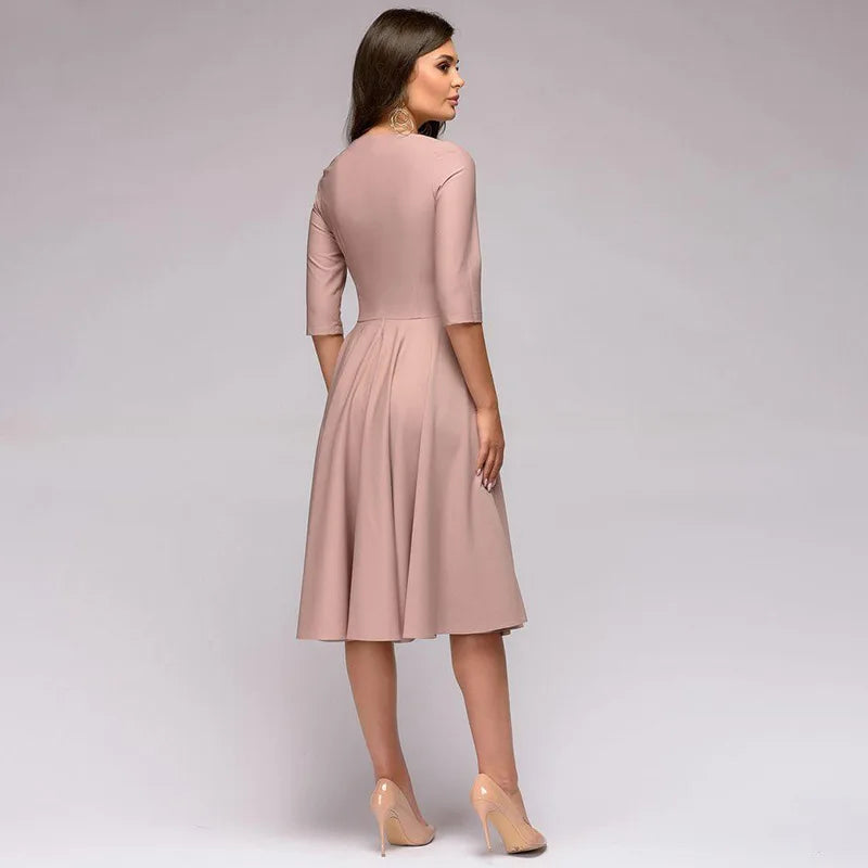 Vestito midi elegante donna con cintura per un look sofisticato, ideale per eventi serali o ufficio.