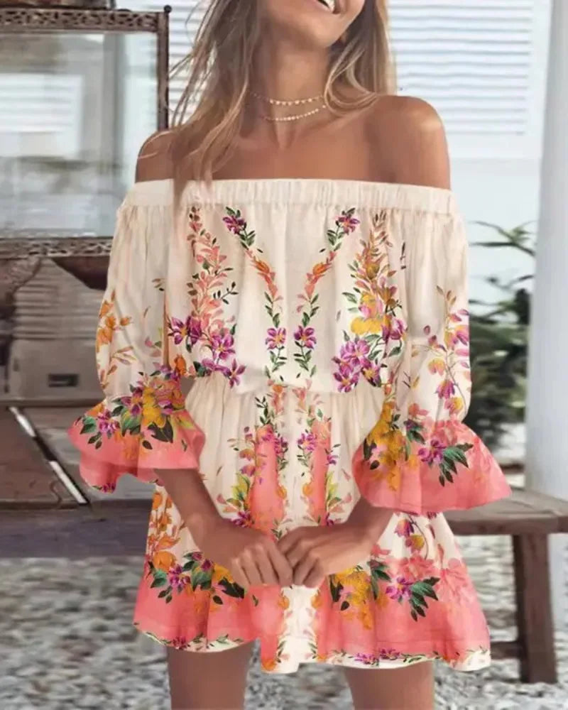Abito da giorno floreale off-shoulder, mini taglio. Abbigliamento donna elegante per ogni occasione.