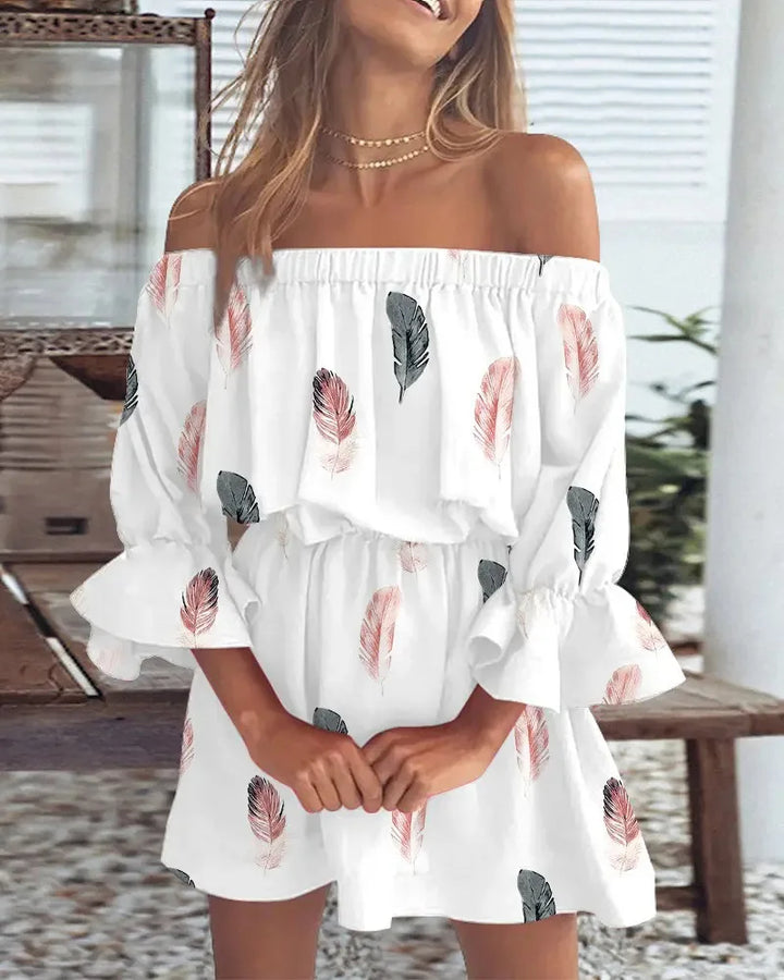Mini abito floreale off-shoulder da donna elegante. Perfetto per primavera/estate, stile casual chic.
