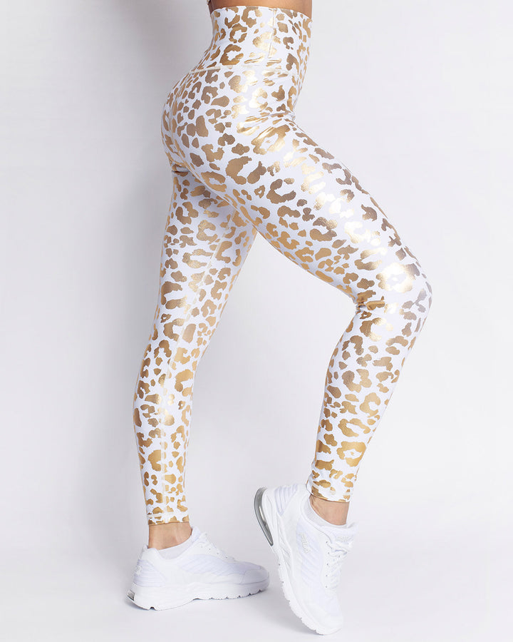 Leggings donna metallizzati leopardati a vita alta, stile sportivo per palestra e look moda athleisure.