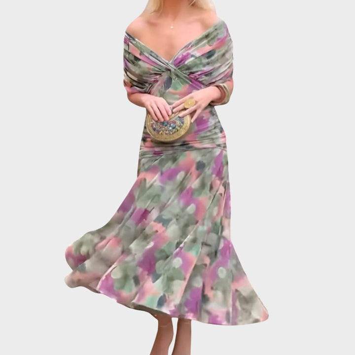 Abito lungo donna elegante senza spalline, con corpetto drappeggiato. Perfetto per serate speciali e cerimonie.