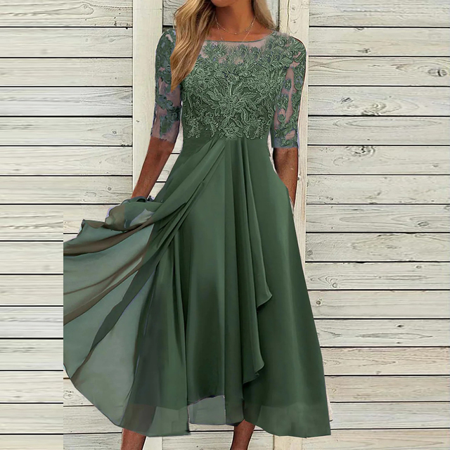 Abito donna autunnale senza maniche con taglio fluttuante, stile midi. Eleganza e comfort per l'abbigliamento donna.