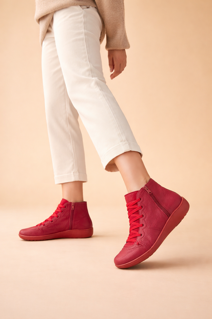 Dettaglio stivaletti ortopedici donna: chiusura zip laterale, supporto caviglia e interno imbottito per massimo comfort.
