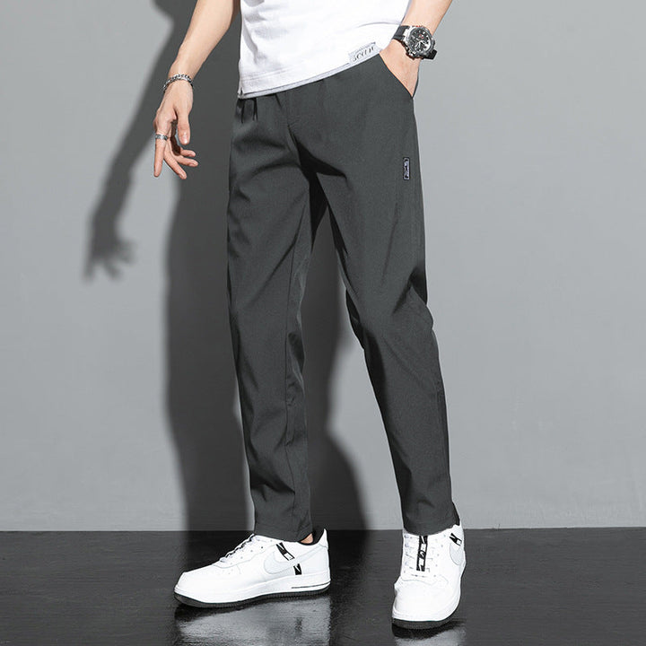 Pantaloni larghi uomo, stile dritto, freschi e traspiranti con coulisse, ideali per moda estiva.