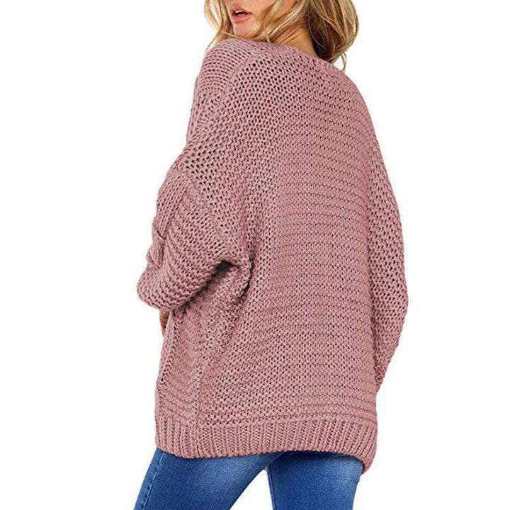 Elegante cardigan donna a trecce grosso, maglia versatile per autunno/inverno. Stile casual e femminile.