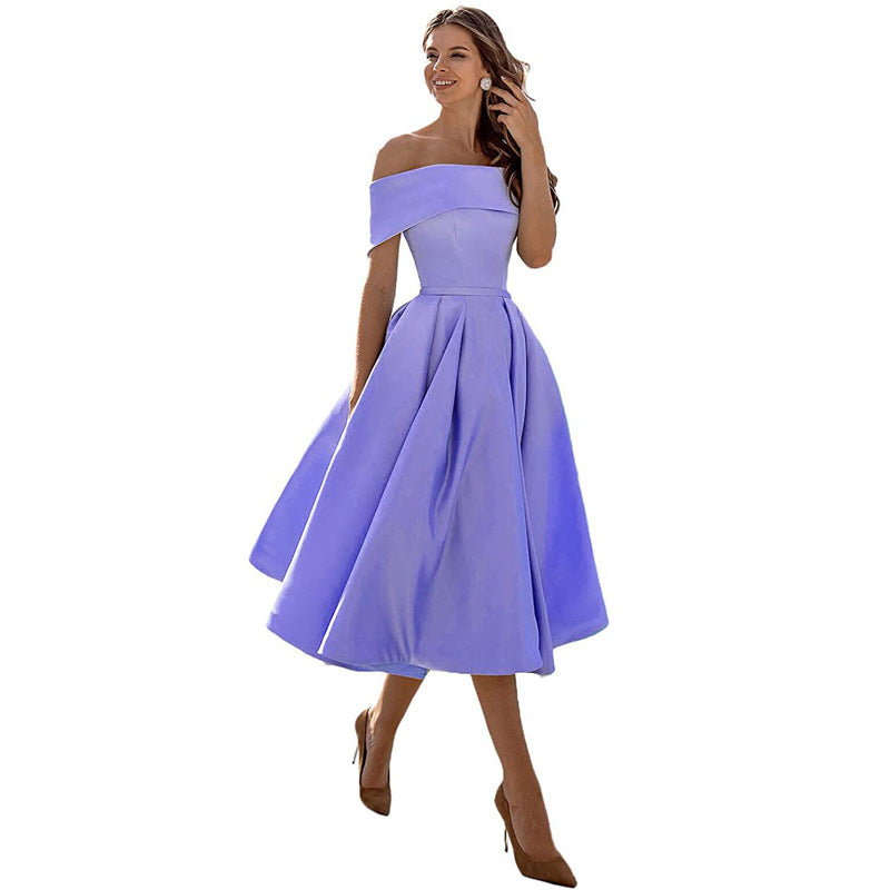 Abito corto donna per feste, stile senza spalline, elegante e versatile per ogni evento.