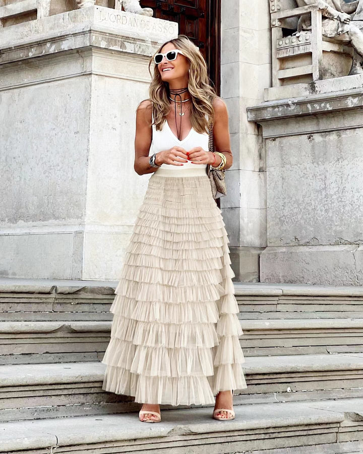 Dettaglio gonna lunga donna, eleganza fluida e vita alta per un look sofisticato.