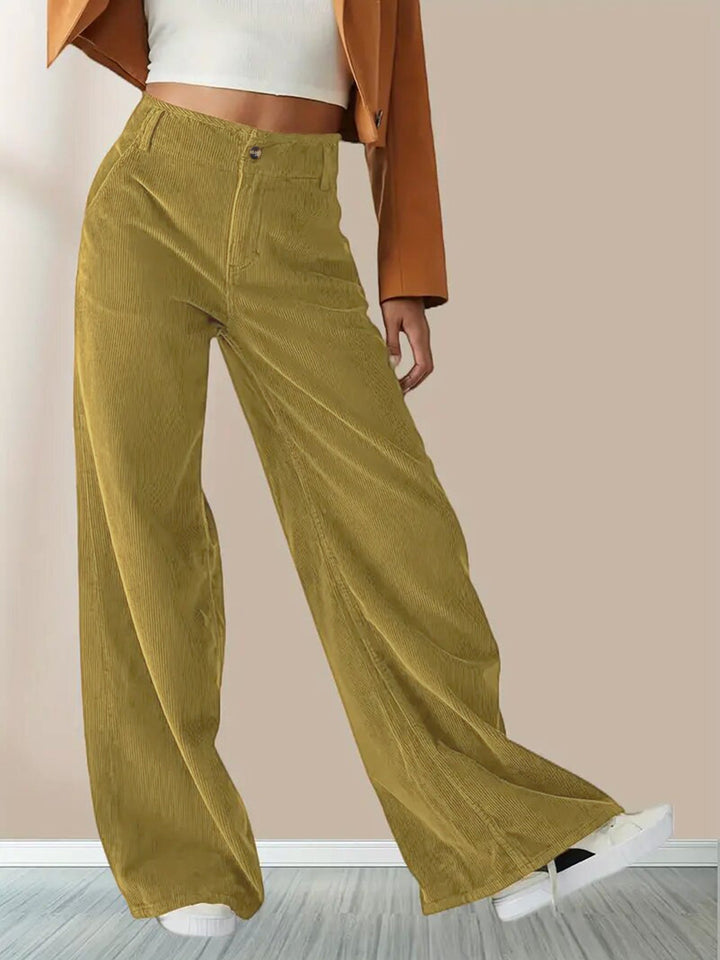 Moda donna: pantaloni casual a vita alta, gamba larga, in tessuto fluido. Perfetti per un comfort elegante.