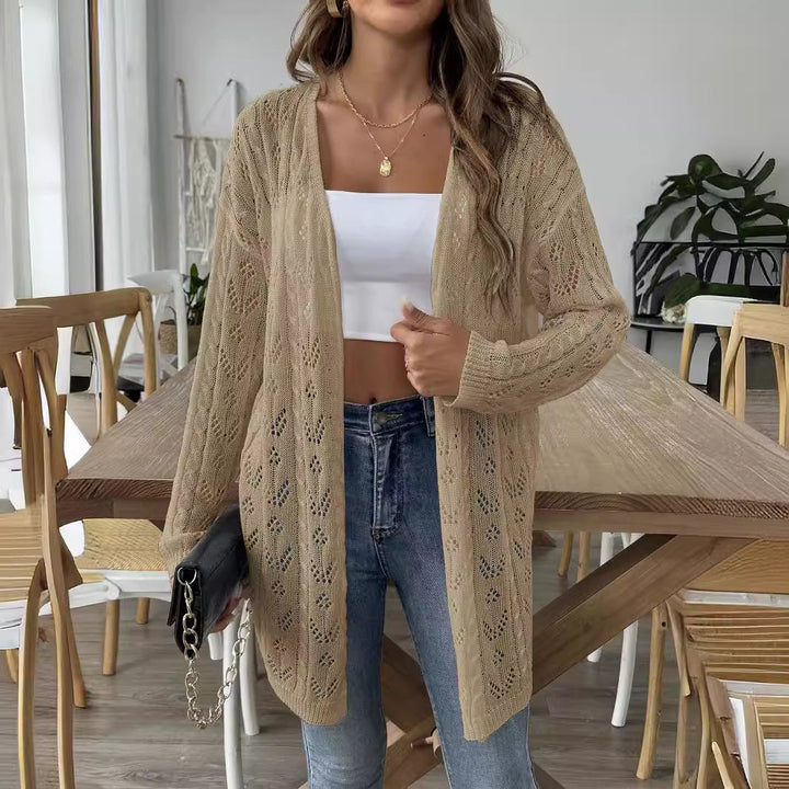 Morbido cardigan aperto oversize da donna, ideale per stratificazione autunnale. Moda casual.