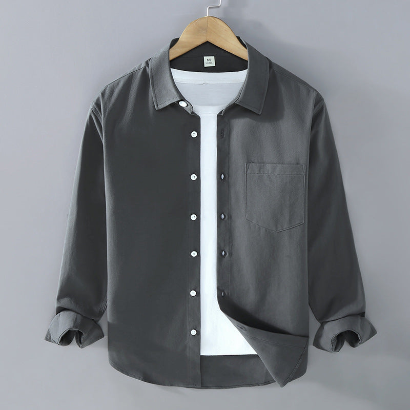 Camicia da ufficio uomo, maniche lunghe, colletto aperto. Vestibilità morbida per un comfort elegante.
