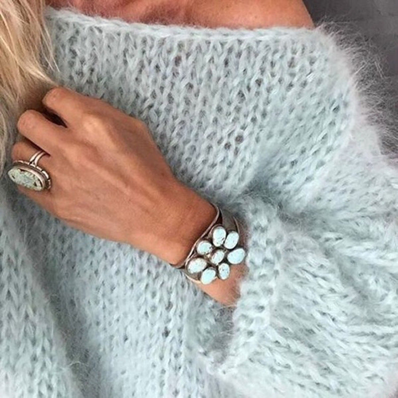 Maglione donna a maniche lunghe, maglieria oversize confortevole. Perfetto per moda femminile autunno inverno.