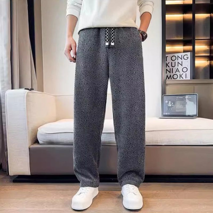 Moda uomo: pantaloni streetwear neri a gamba dritta con vita elasticizzata, per un look contemporaneo casual ed elegante.
