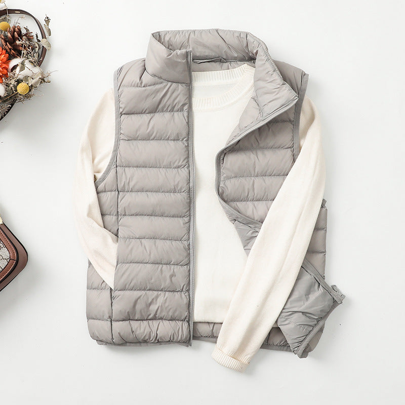 Gilet piumino leggero da donna, versatile per abbigliamento casual autunnale e primaverile.