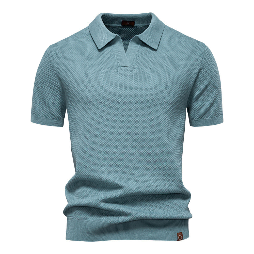 Polo uomo strutturata con trama distintiva, ideale per abbigliamento maschile casual chic e moderno.