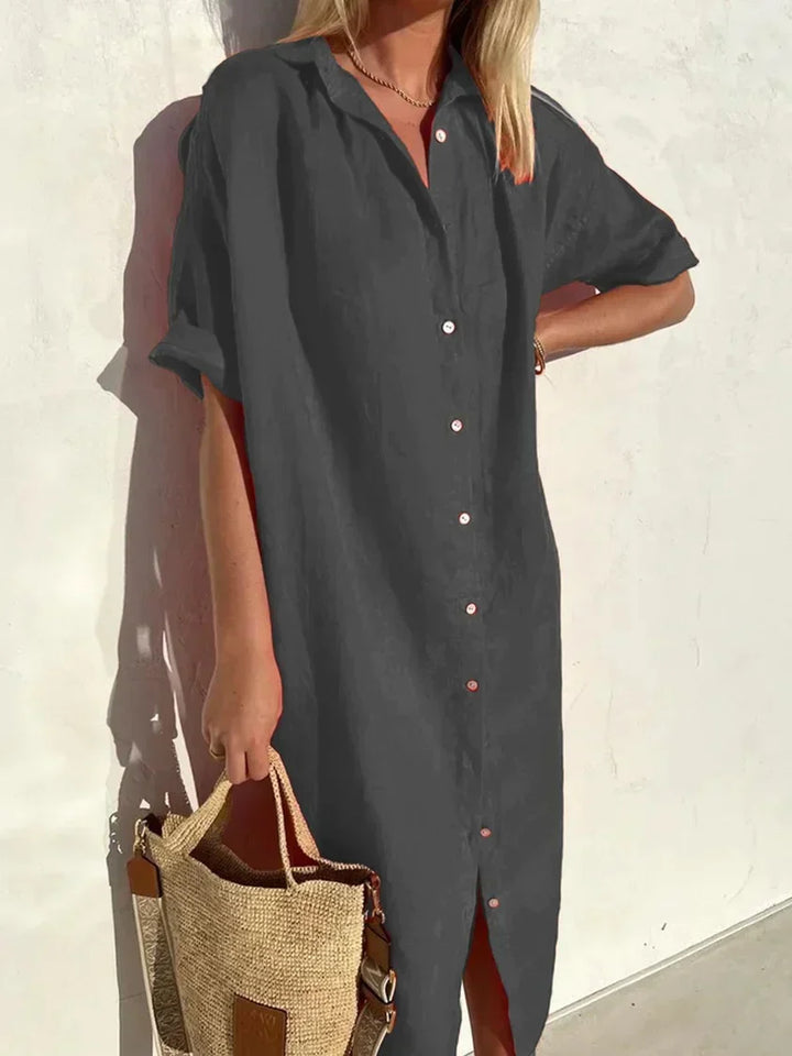 Vestito midi donna casual-elegante con fila di bottoni. Abito estivo a maniche corte, ideale per la moda femminile.