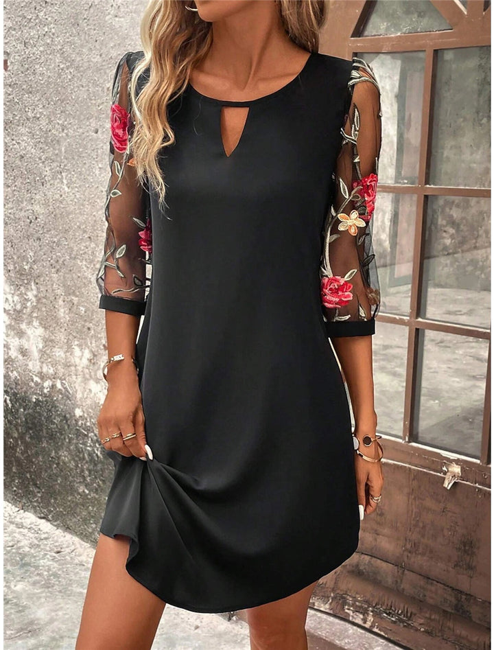 Abito da sera lungo e fluido per donna, perfetto per l'autunno. Vestito elegante per cerimonie e occasioni.
