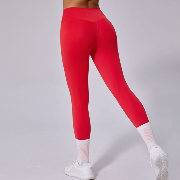 Leggings donna vita alta che offrono comfort e performance per corsa e allenamento intensivo.