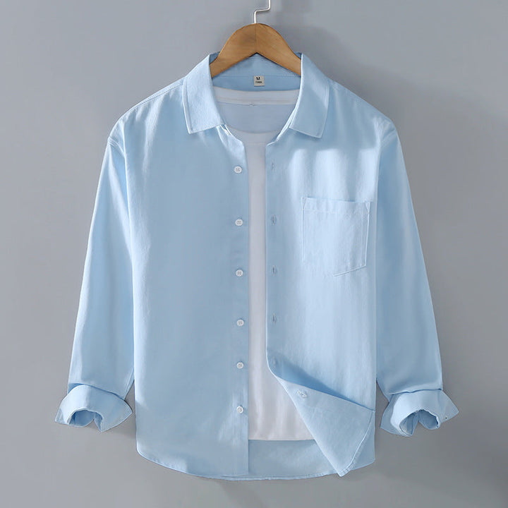 Camicia uomo moderna, maniche lunghe, colletto aperto. Stile morbido e casual per ogni giorno.