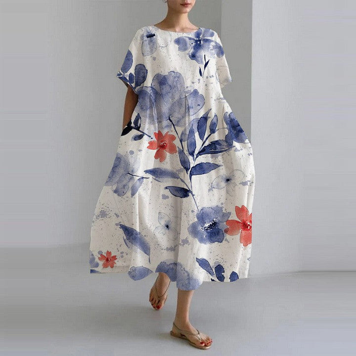 Kaftan donna fluido e leggero, abito estivo con vivace stampa floreale giapponese, eleganza e comfort.