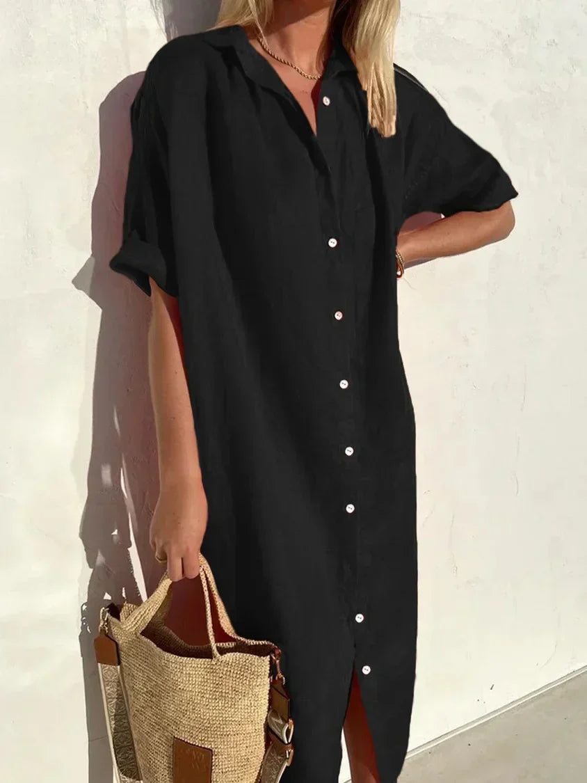 Vestito lungo estivo donna con bottoni e maniche corte. Abito midi versatile, fresco e comodo per la stagione calda.
