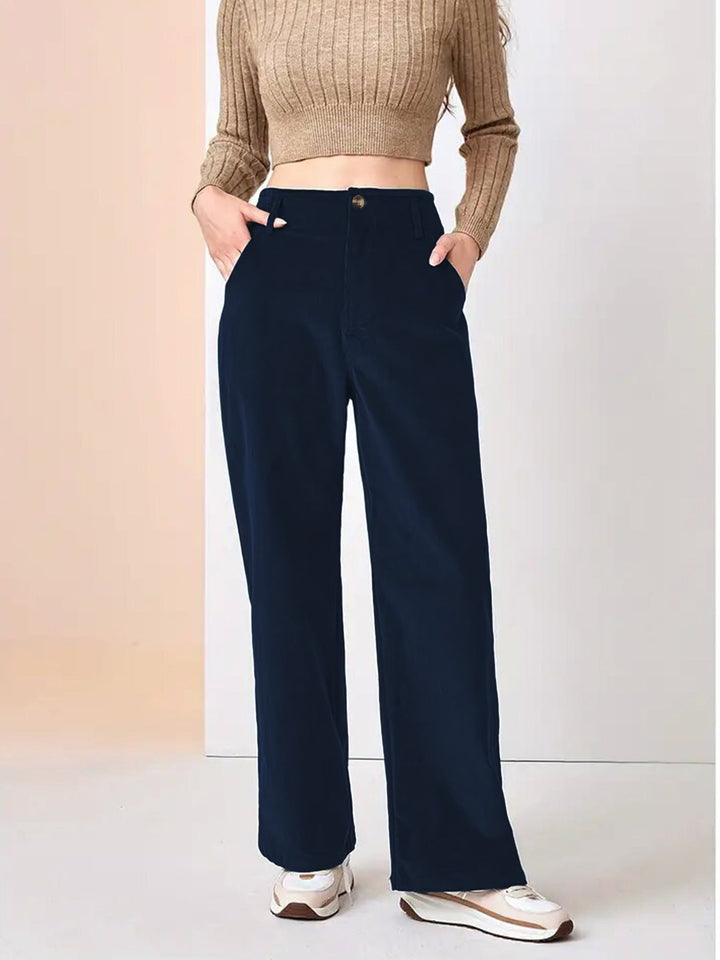 Pantaloni eleganti casual da donna: vita alta, gamba larga, vestibilità comoda. Perfetti per la moda attuale.