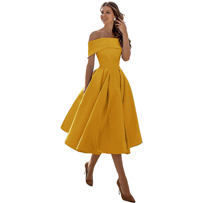 Abito da cocktail senza spalline, vestito elegante e moderno per ogni festa.