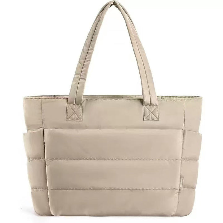 Borsa donna trapuntata, elegante e resistente. Ampia capacità per laptop e accessori, perfetta per ogni occasione.