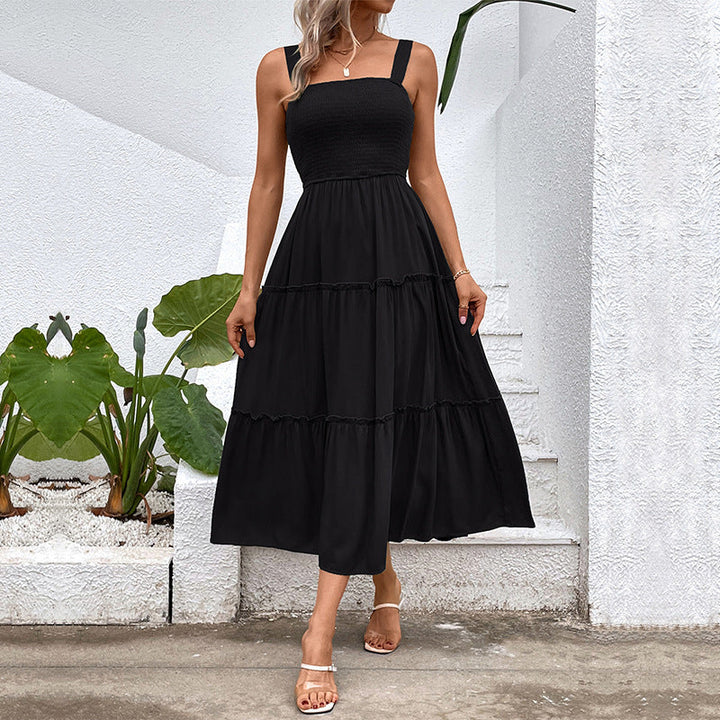 Abito donna fluido con balza e schiena scoperta, stile vintage e fresco per l'estate elegante.