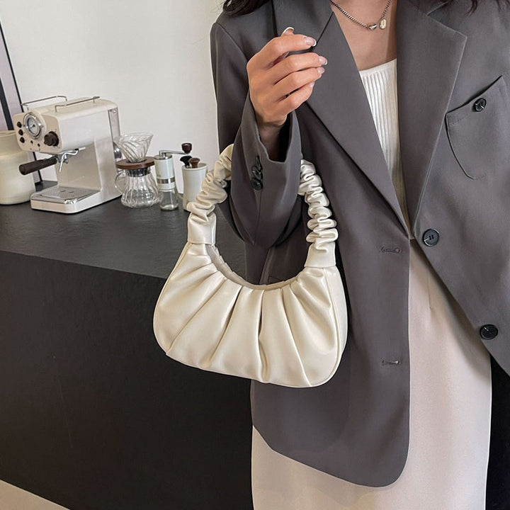 Borsa a spalla donna pieghettata, elegante e spaziosa. Perfetta accessorio moda.