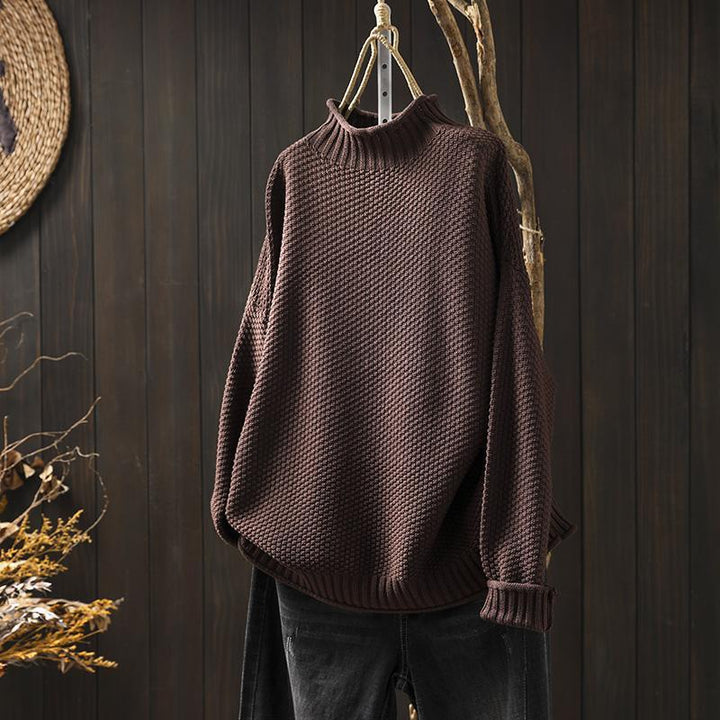Elegante maglione donna invernale a maglia waffle rosa, ideale per un comfort quotidiano.