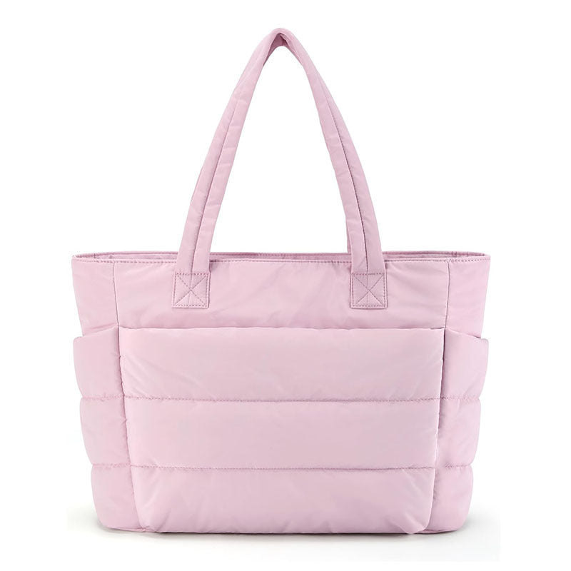 Tote bag donna elegante trapuntata, perfetta per laptop. Design moderno e multiscomparto per moda e funzionalità.