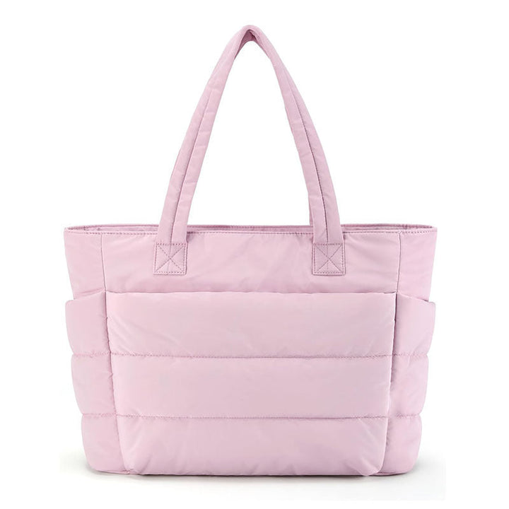 Tote bag donna elegante trapuntata, perfetta per laptop. Design moderno e multiscomparto per moda e funzionalità.