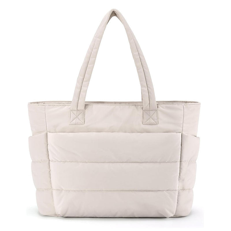 Borsa tote donna spaziosa per laptop. Design trapuntato ideale per il lavoro, viaggi o uso quotidiano con stile.