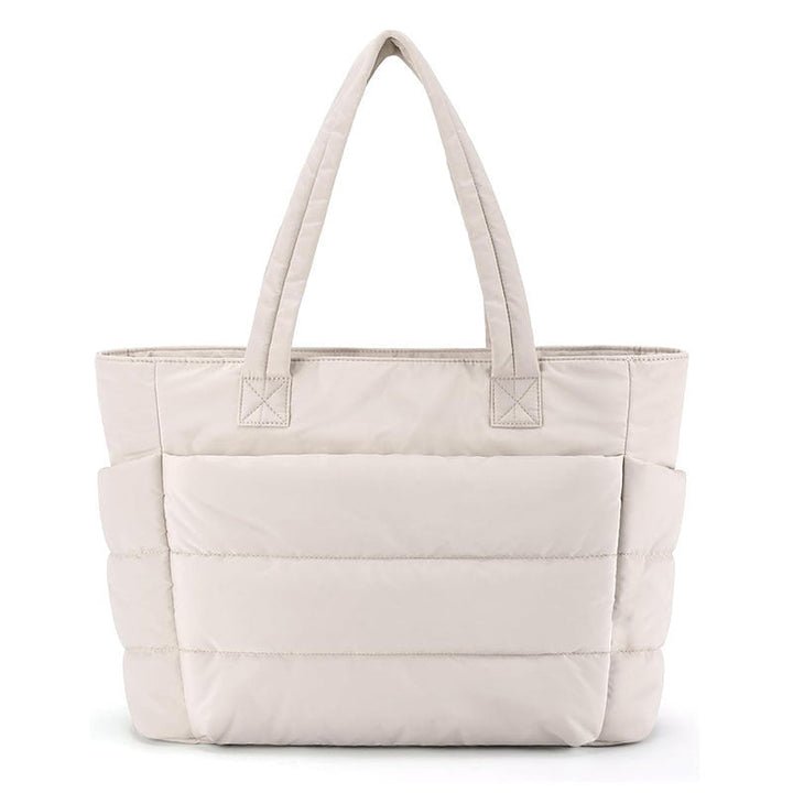 Borsa tote donna spaziosa per laptop. Design trapuntato ideale per il lavoro, viaggi o uso quotidiano con stile.