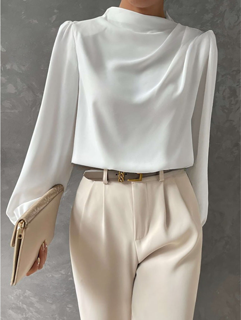 Camicetta da ufficio a collo alto per donna, maniche lunghe. Blusa elegante per un look professionale e comodo.
