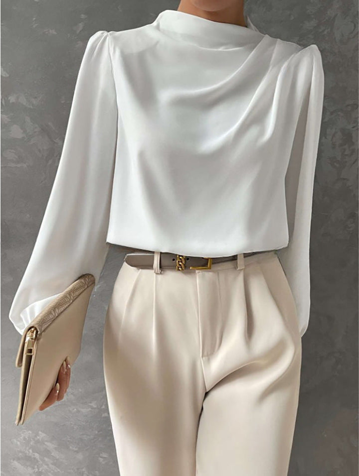 Camicetta da ufficio a collo alto per donna, maniche lunghe. Blusa elegante per un look professionale e comodo.