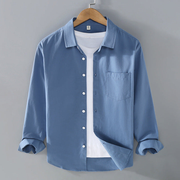 Camicia uomo per primavera, maniche lunghe, colletto aperto. Vestibilità morbida per comfort e stile.