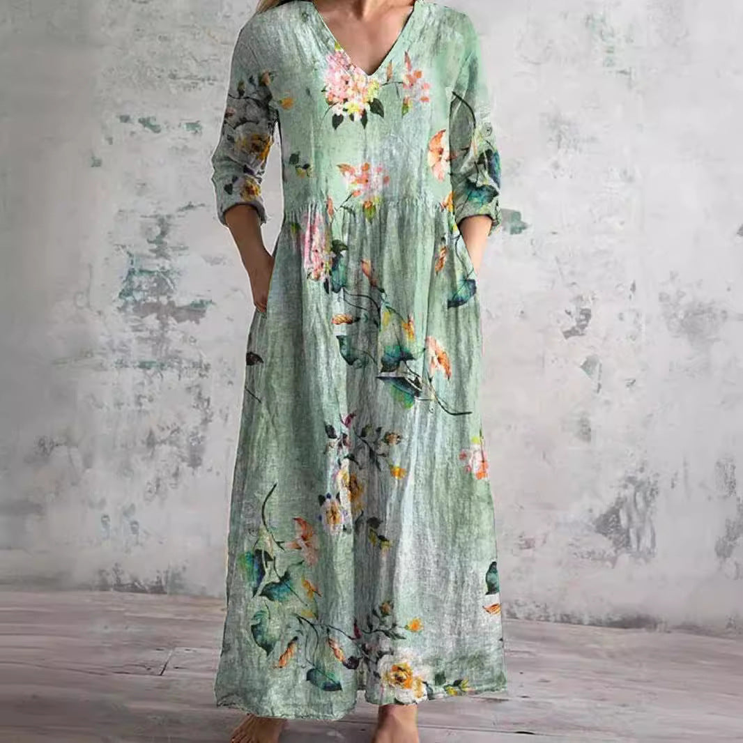 Vestito lungo verde menta da donna, stampa floreale, scollo a V, stile boho per eleganza estiva e comfort fluido.