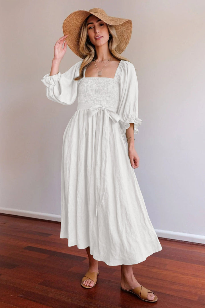 Abito lungo donna elegante con laccio in vita, ideale per serate romantiche estive. Vestito fluido chic.
