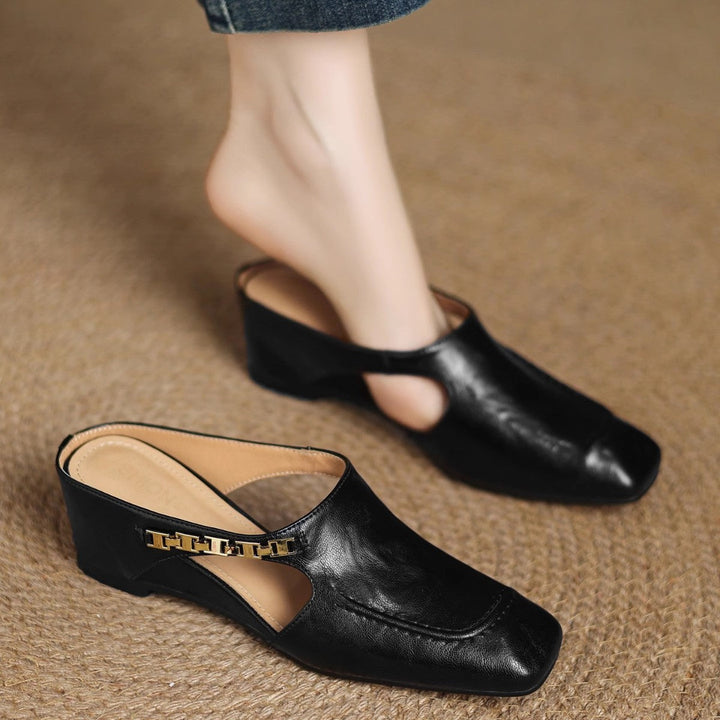 Mules donna retro aperto con plantare imbottito, ideali per comfort casual estivo.