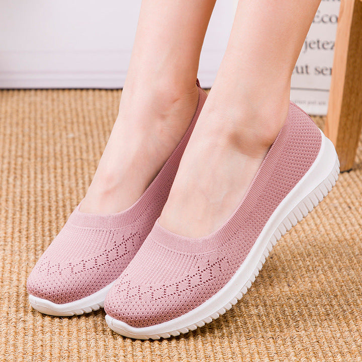 Sneakers donna slip-on con supporto dell'arco e punta ampia per massimo comfort durante la camminata.