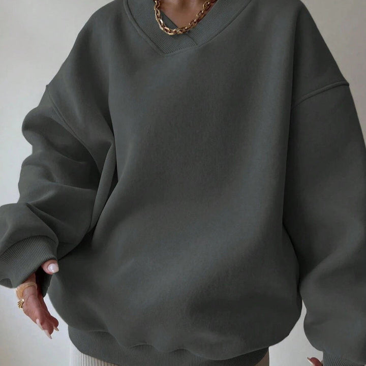 Maglione donna casual scollo tondo, maniche lunghe. Un capo essenziale per la stagione fredda.