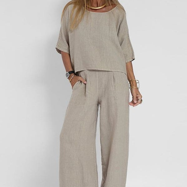 Completo donna moderno: top e pantaloni ampi per un look casual estivo. Set due pezzi leggero e comodo.