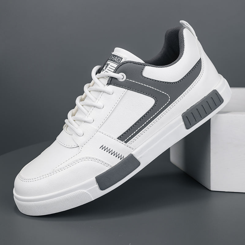 Sneakers uomo bicolore moderne con suola rialzata per comfort e stile. Ideali per outfit casual e sportivi alla moda.