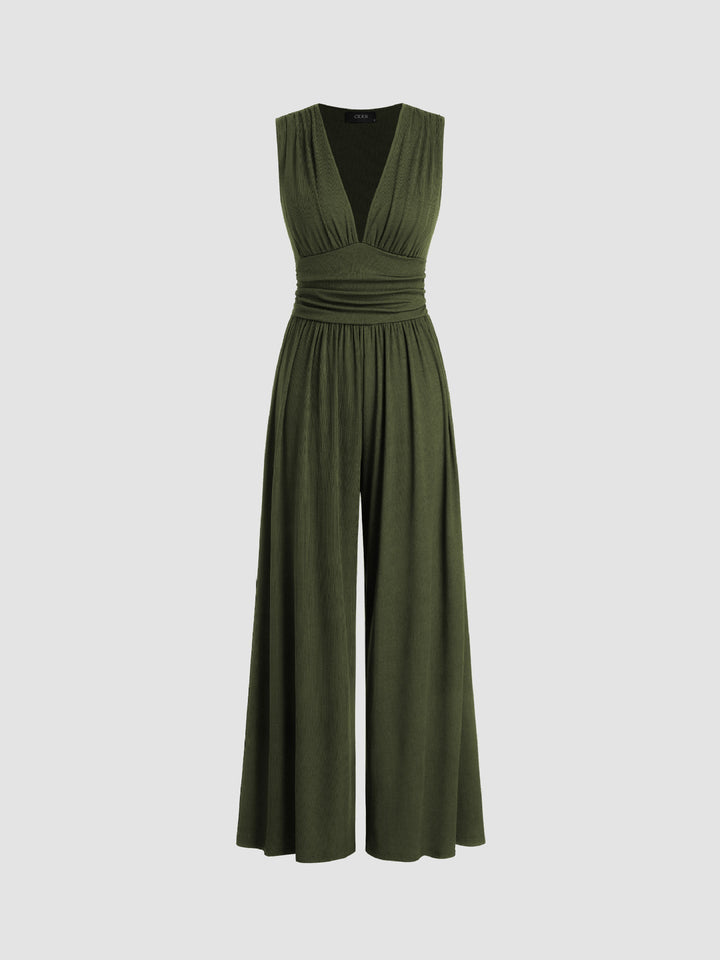 Tuta lunga donna fluida ed elegante, senza maniche e gamba ampia. Ideale per outfit estivi chic e versatili.
